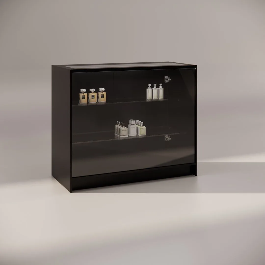 The elegant 1200mm Black Illuminated Glass Counter, featuring a sleek black design and two glass shelves, beautifully displays a collection of skincare and beauty products. With its neutral backdrop, it showcases bottles and jars of diverse shapes and sizes.