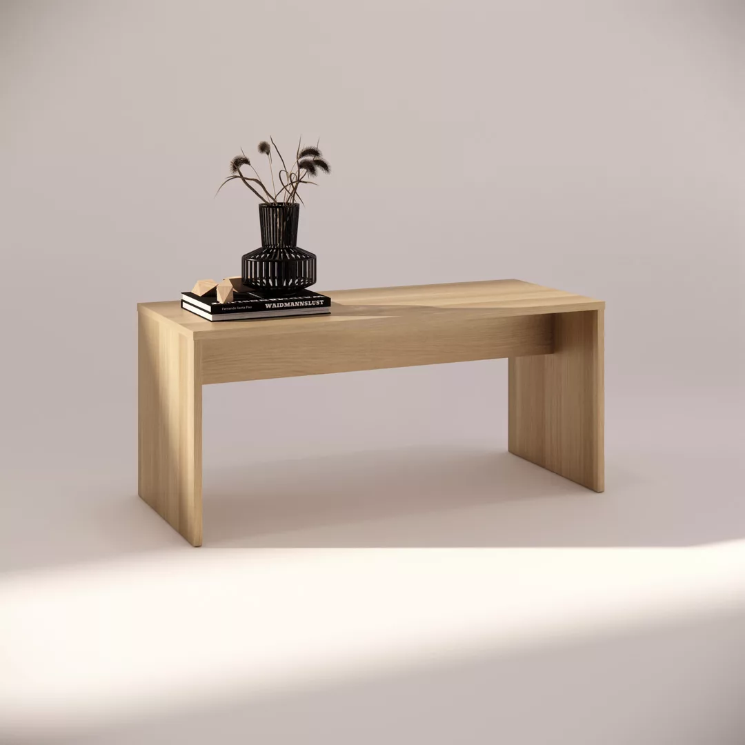 A minimalist wooden bench placed in a well-lit space. It holds a black vase with decorative grasses and a stack of two books, creating a simple yet elegant decor arrangement.