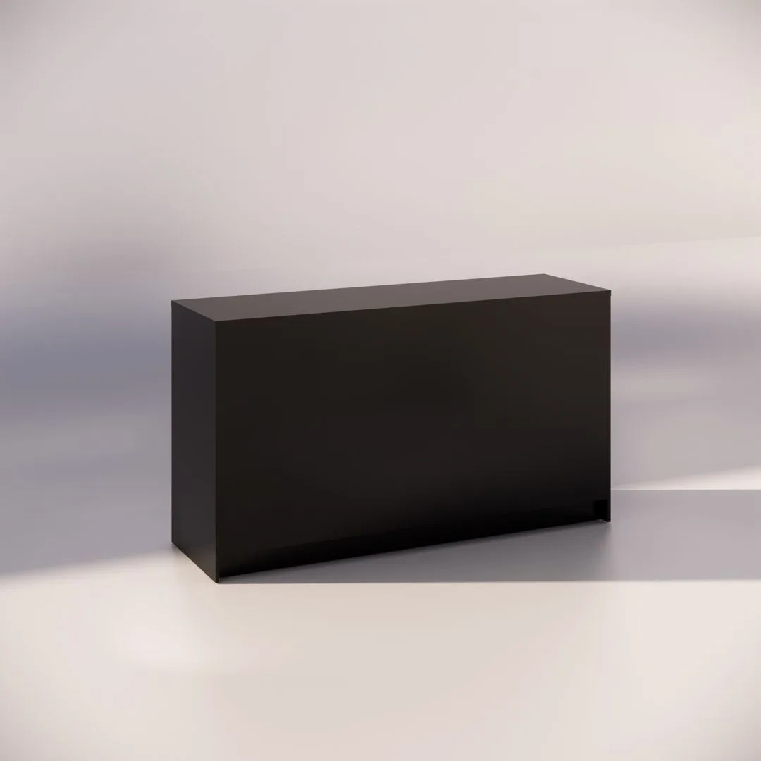 A sleek, minimalist black rectangular block stands on a smooth, light gray surface. Soft shadows fall around it, highlighting its clean lines and simple design. The background is a pale gradient, adding a modern and elegant feel to the image.